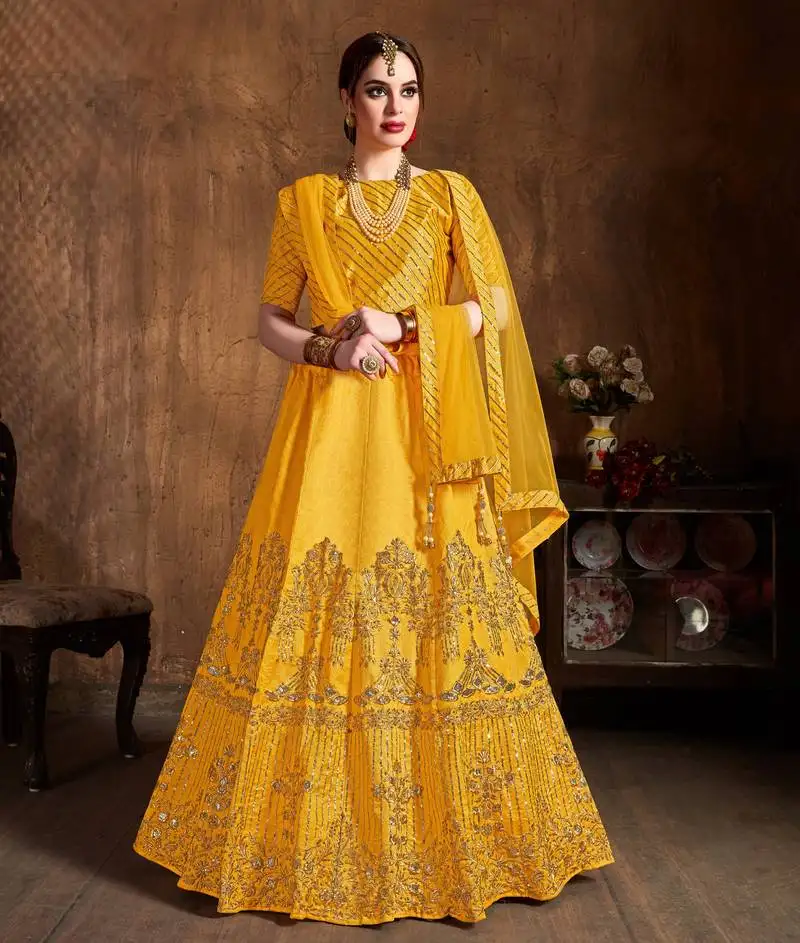 Mesmerizing yellow zari, diamond and sequins embroidered art silk party wear lehenga